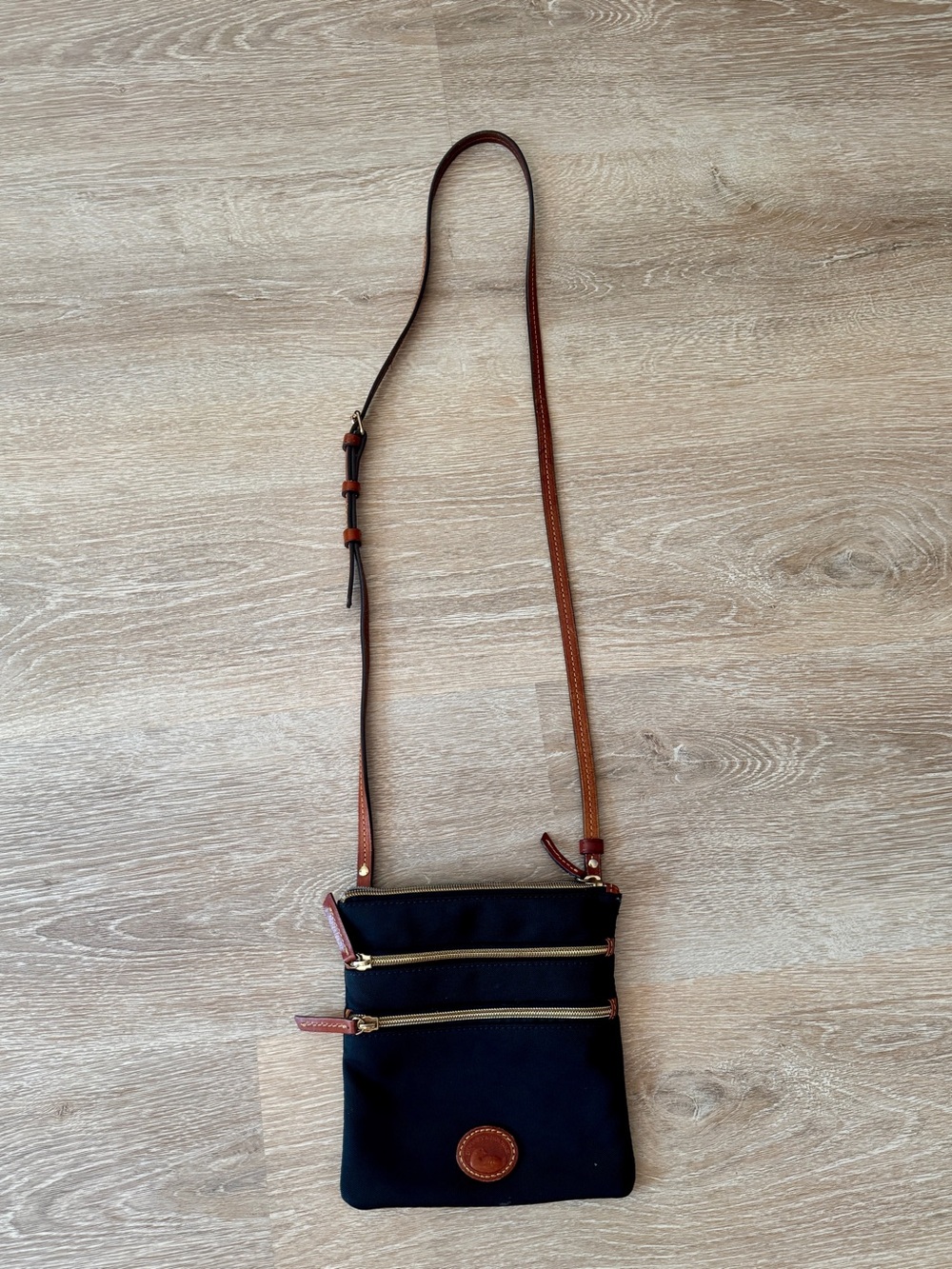 Dooney & Bourke Black Crossbody Bag with Brown Trim